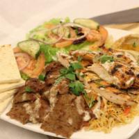 Combo Platter · Chicken, gyros, salad, rice, tzatziki, tahini, hummus, pita bread.