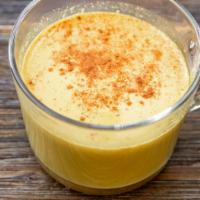 Hot Golden Sunshine Mylk · Turmeric, cinnamon, coconut milk, flax milk, ginger, agave, and a pinch of black pepper