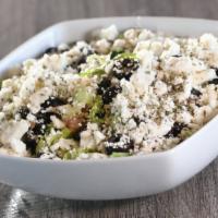Greek Salad · Lettuce, cucumbers, tomatoes, fresh mint, feta cheese, and black olives tossed with a Greek-...
