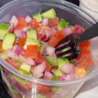 Shirazi Salad (Pairs With Pilsner) · Mixture of cucumbers, tomatoes, red onions & lemon mint dressing.