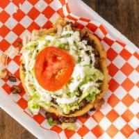 Sopes · Beans lettuce, cheese, sour cream, and tomatoes.