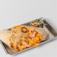 Bacon Breakfast Burrito · Scrambled eggs, bacon, tater tots, and cheddar cheese wrapped in a flour tortilla. Served wi...