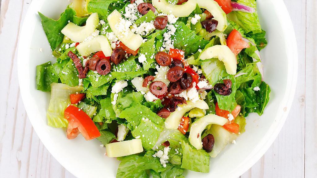 Greek Salad · Romaine lettuce, cucumber, tomato, red onion, kalamata olives, feta cheese, fresh mint, bell peppers, red wine vinaigrette.