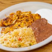 #2 Chorizo Con Huevo · Two scrambled eggs with Mexican sausage. Served with tortillas, sour cream,rice and beans / ...