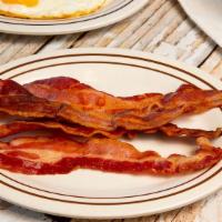 Side Bacon · 4 bacon strips.