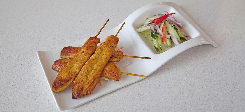 Satay · Skewered slices of marinated beef, chicken or tofu served with peanut sauce and cucumber salad.