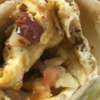 Breakfast Burritos(Meatless) · Include three eggs, hash browns, cheddar cheese, homemade salsa and choice of bacon, ham or ...