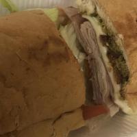 Bld Club Sandwich · Turkey, ham, lettuce, tomato, mayo, bacon, Monterey jack cheese and avocado on an Italian ro...
