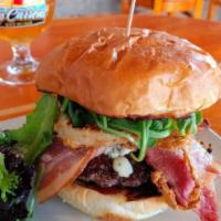 The Blue Dream Burger · 8 Oz. Signature Beef Patty, Gorgonzola, House Bourbon BBQ, Onions Rings, Thick Applewood Smo...