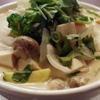 Tom Kha · Vegan. White mushroom, Thai herbs and onion in coconut soup choice of chicken, organic tofu ...