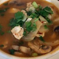 Tom Yum · Vegan and gluten free. White mushroom, Thai herbs, onion and in hot and soup choice of chick...