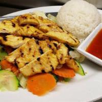 Bbq Chicken · Gluten free. Marinated chicken with Thai herb on top of mix steam vegetables served with swe...