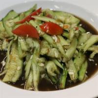 Cucumber Salad · Shredded cucumber mixed with tomatoes, lime juice and fresh chili with your choice of Lao or...