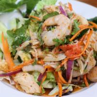 Yum Talay (Spicy Seafood Salad) (Medium) · Shrimp, calamari, and imitation crab meat tossed in house spices, red onions, cilantro, jala...