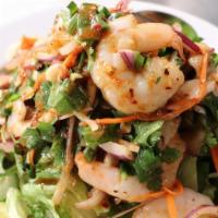 Yum Koung (Spicy Shrimp Salad) (Medium) · Shrimp tossed in house spices, red onions, green onions, cilantro, jalapeños, and lime juice...