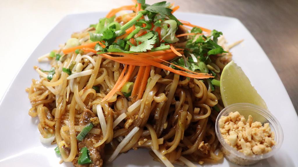 House Pad Thai (Brown Sauce) · Rice noodles, eggs, bean sprouts and green onions in tangy sweeten soy sauce.