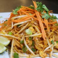 Pad Thai (Red Sauce) · Rice noodles, eggs, bean sprouts, green onions, hint of tamarind cooked in a smokey paprika ...