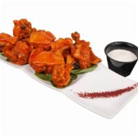 Hot Wings · Eight Wings served with Housemade Creamy Ranch Dressing and Celery Sticks