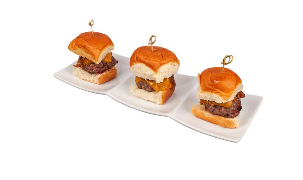 Beef Sliders · Three Freshly Ground Beef Patties served with Caramelized Onions and Cheddar Cheese on King's Hawaiian Sweet Rolls