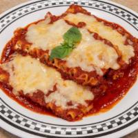 Lasagna · Lasagna with your choice of meat or marina sauce and garlic bread or side salad.