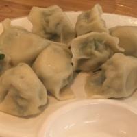 Steamed Dumplings · Steamed dumpling with pork filling. Served with house soy garlic sauce (6 pieces)