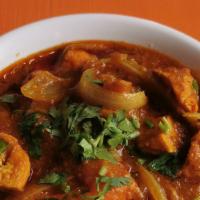 Chicken Jalfrezi · Chicken sautéed with garlic, onions, tomatoes and bell pepper.