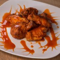 Buffalo Wings · 8 piece slightly spiced Buffalo Wings.