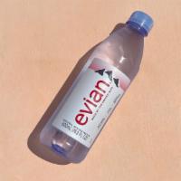 Water · Bottled natural spring water. Currently serving Evian.