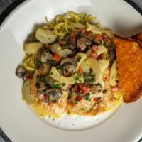 Chicken Piccata Pasta · Sautéed chicken breast with lemon butter, mushrooms, tomatoes, artichoke hearts and capers o...