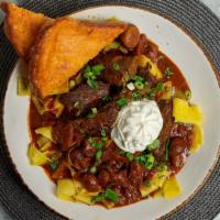 Beef Stroganoff · Braised short ribs with roasted mushrooms and tomatoes in a traditional Russian sauce, with ...