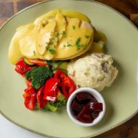 Hot Turkey Dinner · Hot roasted turkey topped with house made gravy. Served with mashed potatoes, sage dressing,...