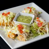 Crispy Taquitos · Four crispy taquitos (chicken & potato) topped with lettuce, sour cream, cotija cheese, and ...