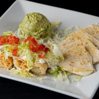 Tulum Appetizer · Two crispy taquitos (chicken & potato), quesadillas, and guacamole.