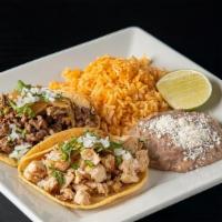 Tacos · Two soft handmade corn tortillas filled with your choice of chicken, steak, carnitas, pastor...