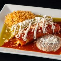 Enchiladas · Two corn tortillas filled with chicken or veggies.  Topped with green, red or mole sauce, cr...
