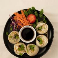 Steamed Vegtable Dumpling · 5 pieces.