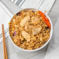 Fried Rice · Egg, mixed vegetables and white rice, tossed in a subtle brown sauce.