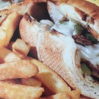 Philly Cheese Steak Sub Combo · Thinly sliced steak sautéed with mushrooms, bell peppers, onions, topped with mozzarella che...