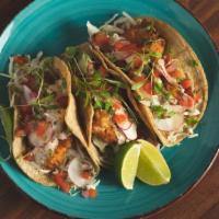 Privateer Fish Tacos · Three beer-battered or grilled (market fish) tacos with privateer crema, pico de gallo, cabb...
