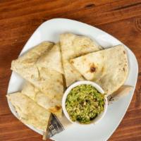 Grilled Pita Bread · House made dill pita bread served with warm vegan spinach artichoke dip (contains nuts)