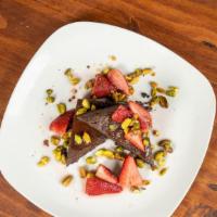 Double Fudge Tart · Macerated strawberries, toasted pistachios, house smoked maldon sea salt