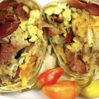 Bacon Breakfast Burrito · Chopped bacon, crispy hashbrowns, Monterey jack and cheddar cheese. *Spicy or mild red salsa...