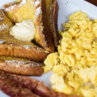 French Toast Breakfast Plate · 4pc golden-grilled French toast topped with powdered sugar and cinnamon, two eggs any style ...