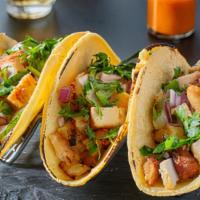 Chicken Tacos · Fresh Taco made with Grilled Chicken, onions, salsa, and cilantro.
