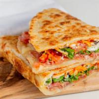Reggio Sandwich · Prosciutto, parmigiano-reggiano, mozzarella, mushrooms, arugula, tomatoes, tartar sauce and ...