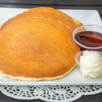 Pancake Sandwich · Two pancakes served with two eggs any style and your choice of two bacon strips or two sausa...