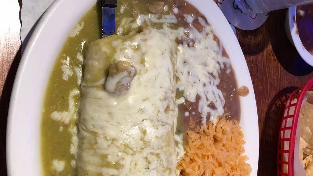 Chile Verde Burrito · Comes with rice and choice of refried or black beans.
