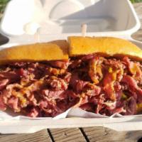 French Dip Pastrami · Thinly sliced pastrami, French mustard, pickles, French roll. Add extra protein, fries, chee...