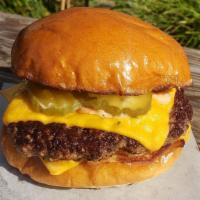 Cheeseburger · Brioche potato bun, thousand island, pickles, onions, American cheese. Add extra patty for a...