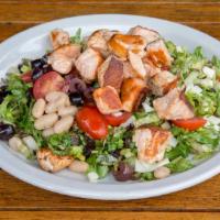 Chopped Salad · Romaine lettuce, mixed greens, cherry tomatoes, provolone cheese, kalamata olives and cannel...